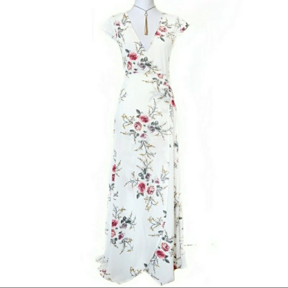 Dresses & Skirts - Beautiful floral wrap dress NWOT